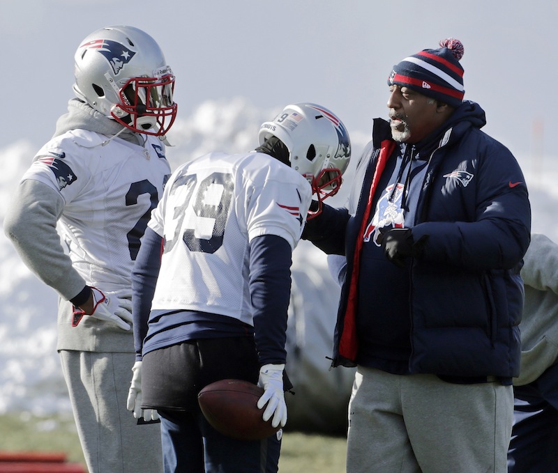 New England Patriots running back coach Ivan Fears, right, instructs running backs Stevan Ridley (22) and Danny Woodhead (39) during NFL football practice in Foxborough, Mass., Wednesday, Jan. 2, 2013. . The Patriots don't know who they'll face in their playoff opener. But, they do know plenty about that team. They are familiar with all three potential opponents, the Texans, Ravens and Colts, having played them already this season. (AP Photo/Charles Krupa)