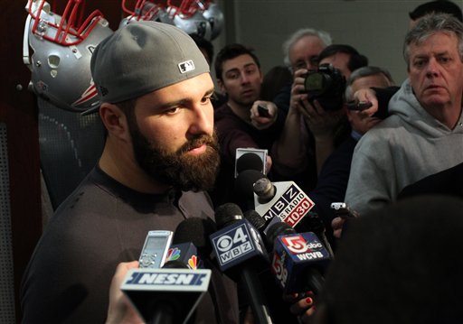 New England Patriots defensive end Rob Ninkovich talks with the media in the locker room at Gillette Stadium on Monday.