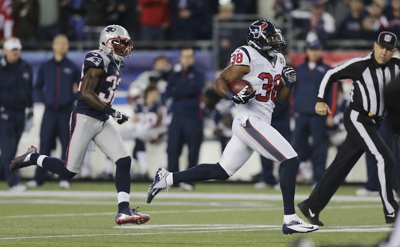 Houston Texans free safety Danieal Manning is chased by New England Patriots free safety Devin McCourty, left, on a 94-yard kickoff return during the first half of an AFC divisional playoff NFL football game in Foxborough, Mass., Sunday, Jan. 13, 2013. (AP Photo/Charles Krupa)
