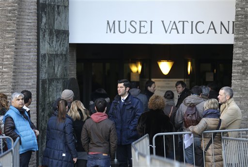 People queue to enter the Vatican Museums at the Vatican earlier this month. It's "cash only" now for tourists at the Vatican wanting to pay for museum tickets, souvenirs and other services after Italy's central bank decided to block electronic payments, including credit cards, at the tiny city-state.