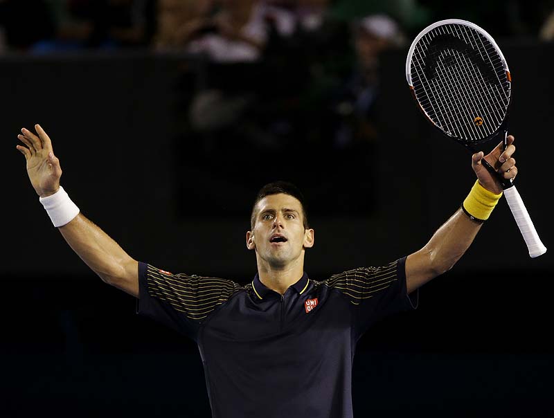 Novak Djokovic celebrates his fourth-round win over Stanislas Wawrinka at the Australian Open Monday. Djokovic needed five sets and more than 5 hours to advance.