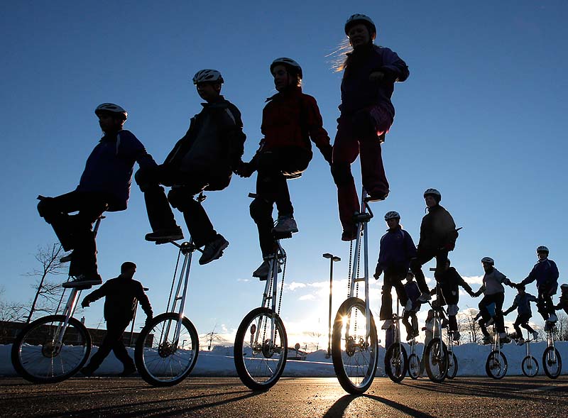 Members of the Gym Dandies Children’s Circus practice riding unicycles in formation at Scarborough High School on Saturday in preparation for the Presidential Inaugural Parade.