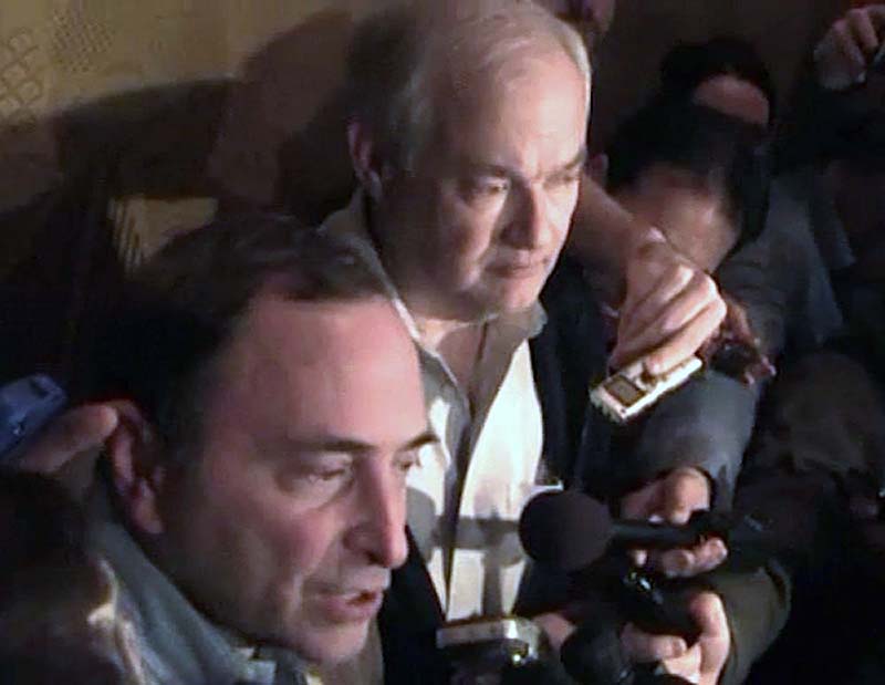 In this image from video, NHL commissioner Gary Bettman, left, talks to the media as Donald Fehr, executive director of the NHL Players' Association, stands next to him, in New York, early Sunday. A tentative deal to end the 113-day NHL lockout was reached early Sunday morning following a marathon 16-hour negotiating session.