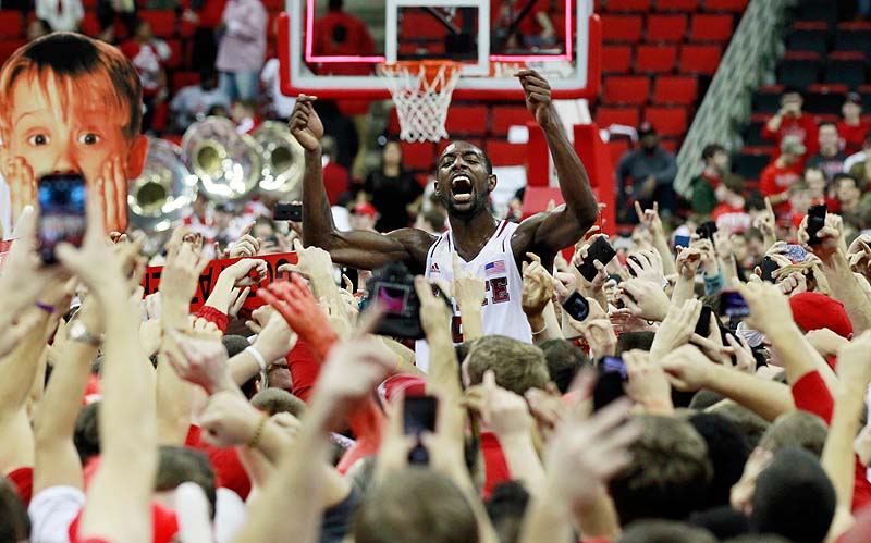 North Carolina State's C.J. Leslie celebrates with the fans after the Wolfpack's 84-76 win over top-ranked Duke in Raleigh, N.C. on Saturday.