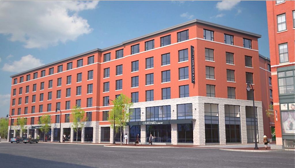 An artist's rendering of the proposed Courtyard by Marriott planned for a site at 321 Commercial St. now occupied by a dirt parking lot.