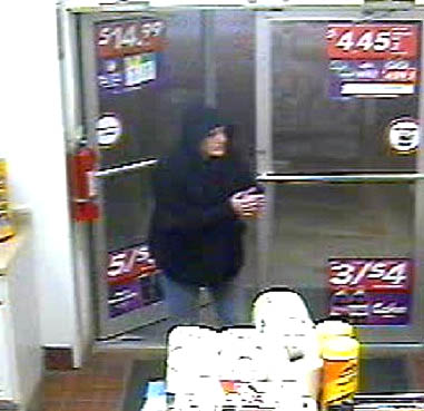 Police released this video surveillance image of the woman who they say committed an armed robbery at the Circle K in Farmingdale Sunday night.