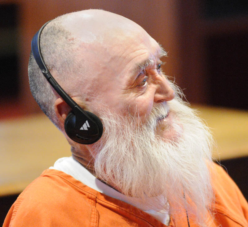 Wearing headphones to hear the court proceedings, Gary Raub pleaded not guilty to the charge of criminal homicide in the first degree, as it was called in the statutes in 1976 this morning in Kennebec County Superior Court in Augusta. He is charged with the 1976 fatal stabbing of 70-year-old Blanche M. Kimball inside her home on State Street in Augusta.