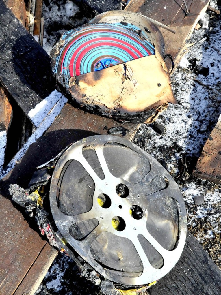 Some of the burned reels of film that were part of a lifetime collection owned by Richard Searls and were destroyed in a fire at his home in Solon last Saturday.