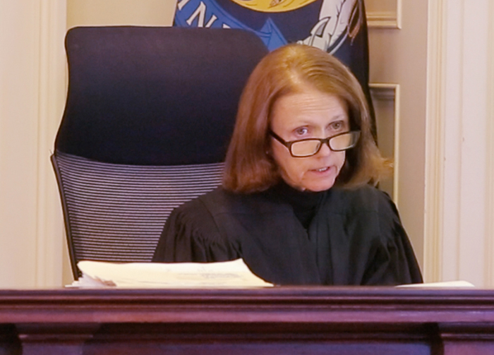 Justice Nancy Mills addresses the court regarding an objection filed by the Portland Press Herald to allow media coverage of jury selection in the trial of Mark Strong at York County Superior Court in Alfred on Wednesday.