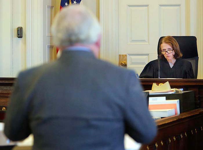 Justice Nancy Mills listens to Daniel Lilley, attorney for Mark Strong, during a motion hearing at York County Superior Court in Alfred on Thursday.