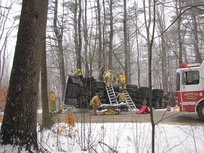 This contributed photo show emergency personnel on the scene of a truck rollover in Windham.