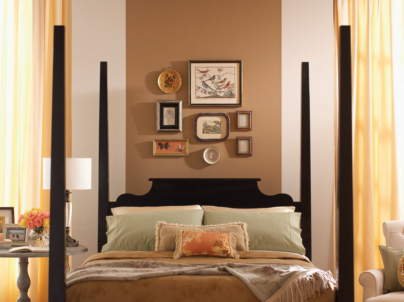 One designer suggests limiting the palette in a small room to two or three colors. In this bedroom, a wide stripe behind the bed makes the ceiling feel taller.
