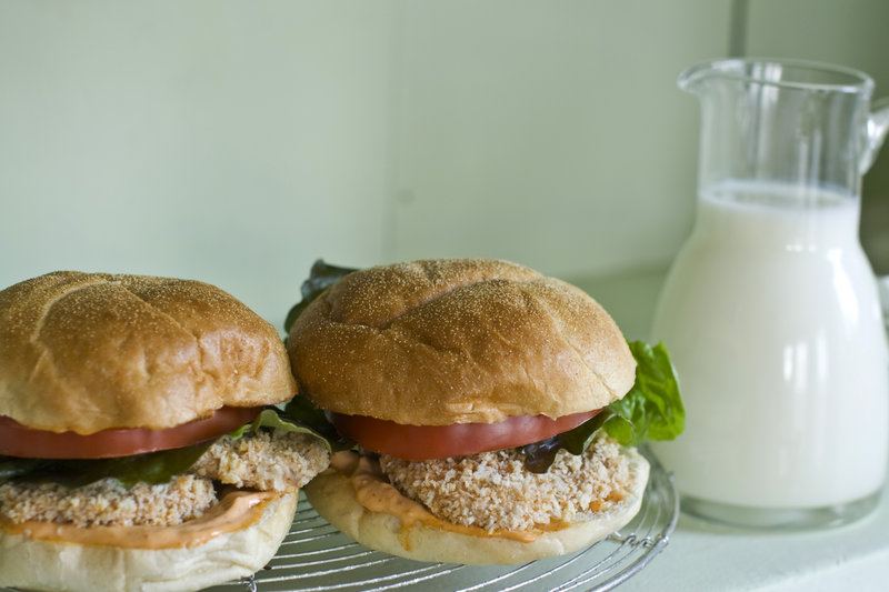 Buttermilk-soaked pork tenderloin cutlet sandwiches. The acid in the buttermilk also helps to tenderize the meat
