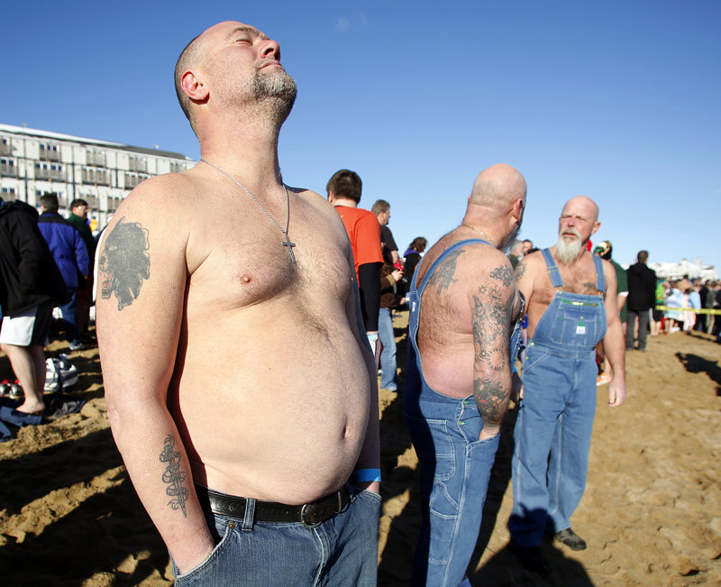 Dean Devoe of Sanford, a member of the “Hillbilly Rockers,” gets mentally prepared to jump into the Atlantic Ocean during the 25th annual Lobster Dip to benefit Special Olympics Maine in front of The Brunswick in Old Orchard Beach on Tuesday.