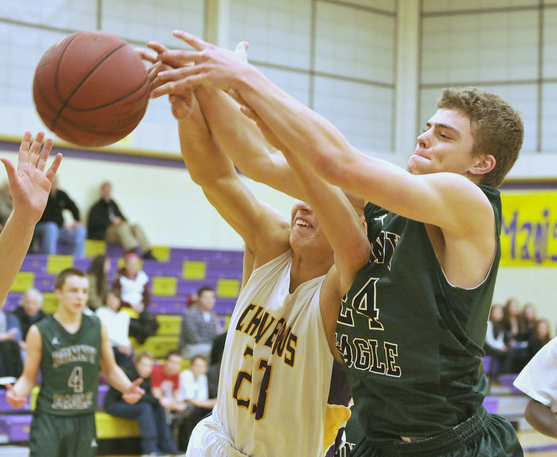 Zordan Holman of Cheverus, left, competes with Jon Thomas of Bonny Eagle for a rebound Wednesday night during Bonny Eagle’s 69-48 victory in an SMAA game at Cheverus High.