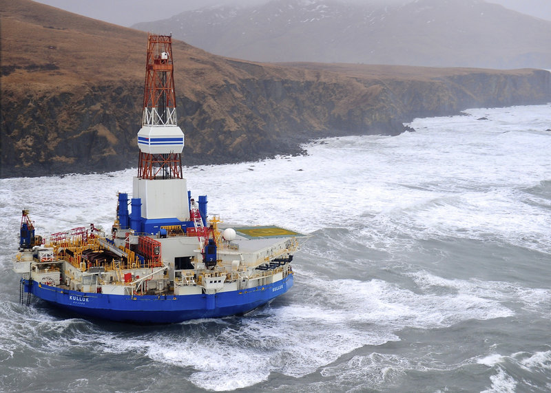 The Royal Dutch Shell drilling rig Kulluk lies aground off Sitkalidak Island, near Kodiak Island in Alaska, this week. No oil leaks have been seen from the drilling ship.