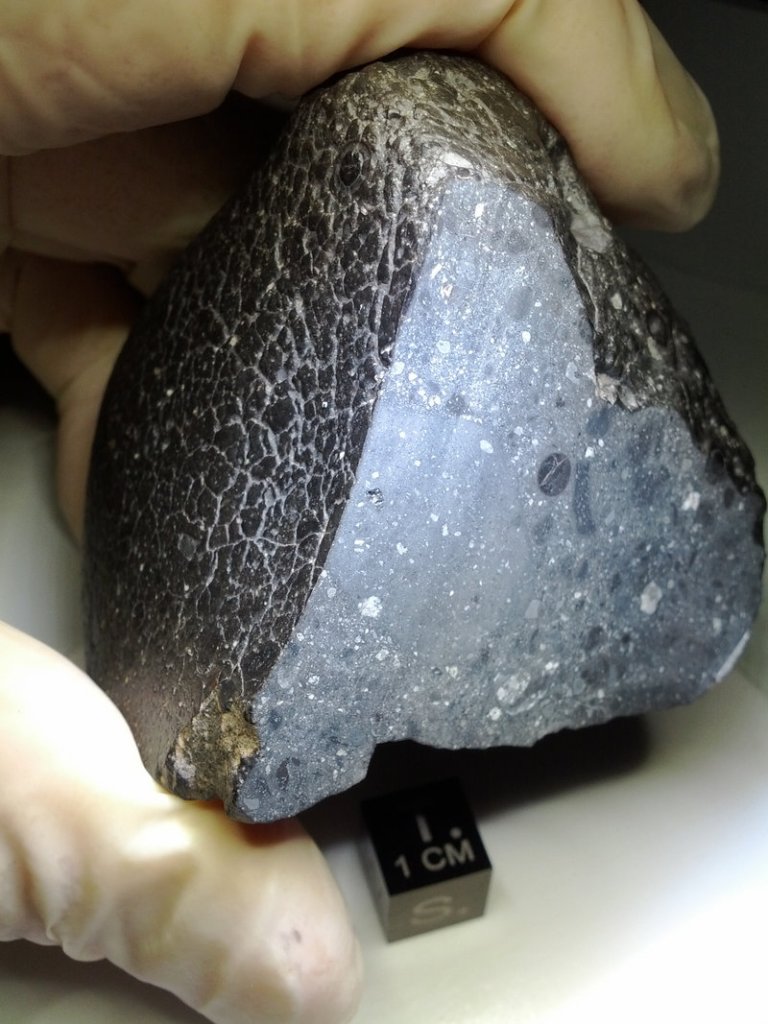 The Martian meteorite known as NWA 7034 is about 2 billion years old and contains more water than other meteorites from Mars.