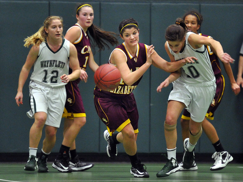 Marlo Dell’Aquila of Cape Elizabeth breaks away from the pack during the second half of Thursday’s Western Maine Conference girls’ basketball game at Waynflete. Dell’Aquila had 18 points in the Capers’ 49-45 upset overtime win.