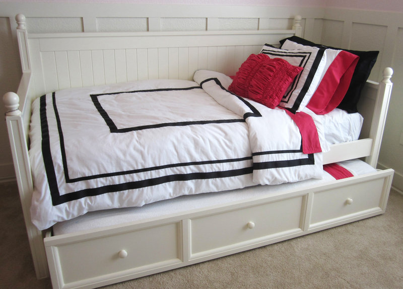 This is a knock-off version of a popular but pricier PB Teen bedding ensemble that uses inexpensive sheet sets and iron-on ribbons created by Allison Hepworth.