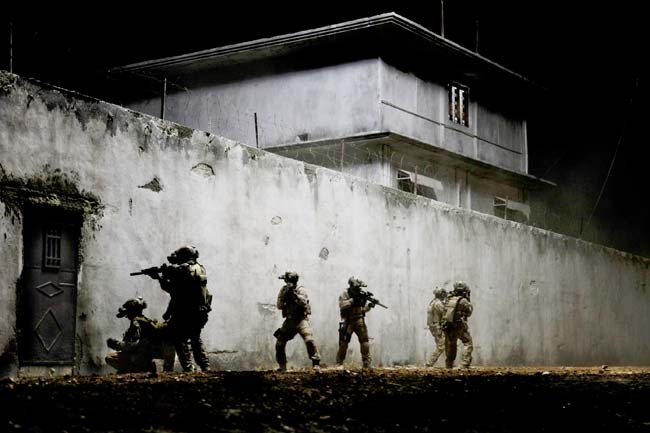 Navy SEALS outside the compound where they would find Osama bin Laden.