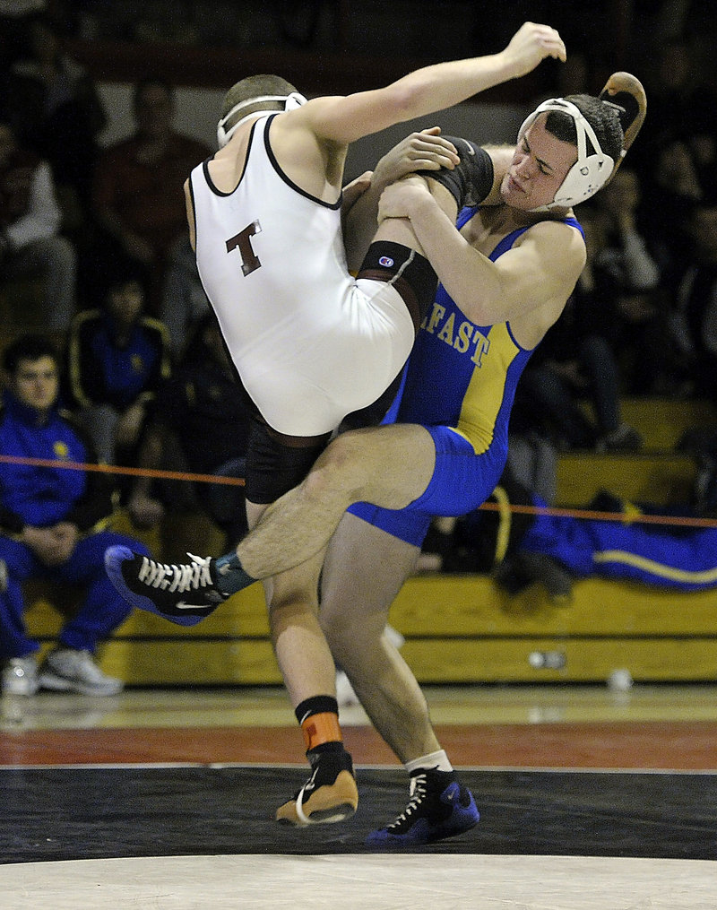 Brent Waterman of Belfast is on his way to pinning Josh Burnham of Timberlane to take the 138-pound division.
