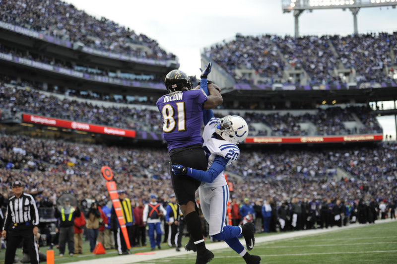 Baltimore wide receiver Anquan Boldin (81) hauls in a touchdown pass against Indianapolis cornerback Darius Butler (20) in the fourth quarter of the Ravens’ 24-9 wild-card win. Boldin set a team record with 145 yards receiving.