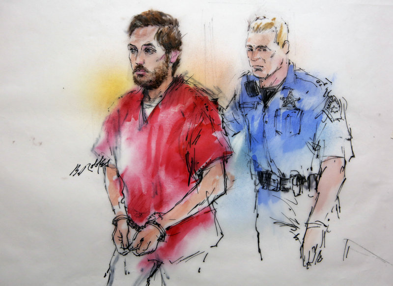 This courtroom sketch shows accused killer James Holmes being escorted by a deputy as he arrives at a preliminary hearing at which he showed no emotion Monday.