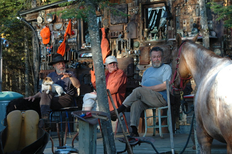 Eddie Fitzpatrick, center, in “Porch Talk” by Diane Hudson, from “Travels with Eddie and Other Surprises.”