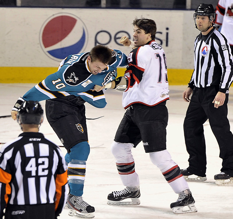 Joel Rechlicz gets ready to land a right to Worcester’s Frazer McLaren in a first-period fight in Portland’s 7-3 win.