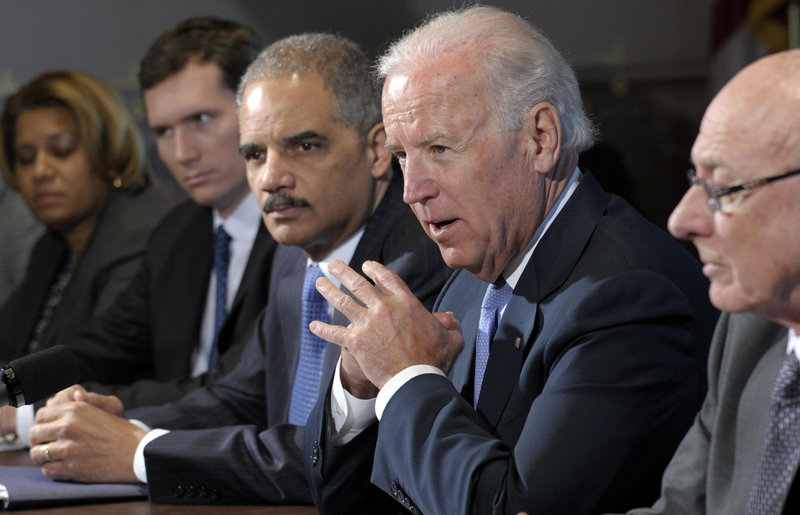 Vice President Joe Biden, with Attorney General Eric Holder, speaks at a meeting with victim’s groups and gun safety organizations at the White House complex on Wednesday.