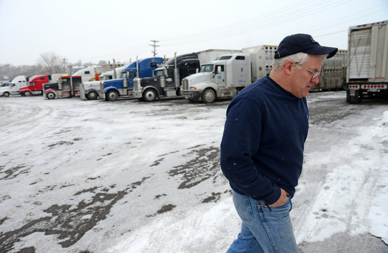 Trucker Roy Olds of Dubuque, Iowa, shown at a truck stop in Minneapolis, Minn., in December, believes big companies can’t retain drivers because they don’t pay enough.