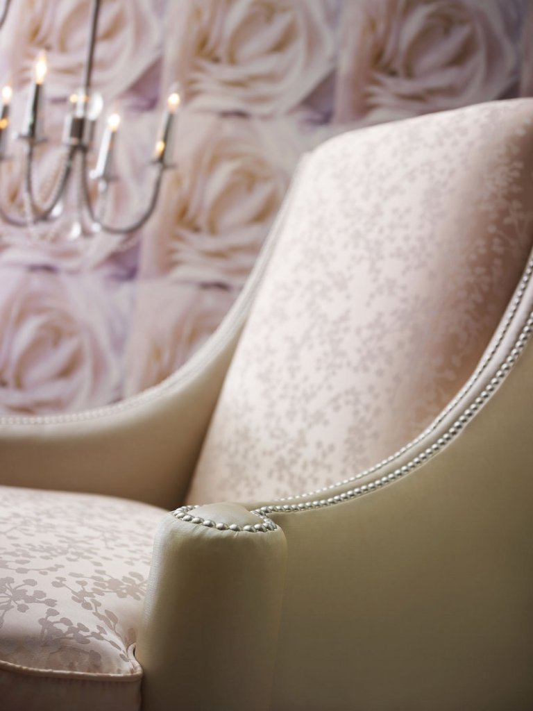 Shimmery fabrics and finishes are in vogue now, adding a bit of glamour to everyday environs. This Sloane chair is from the Candice Olson furniture collection created for Highland House.