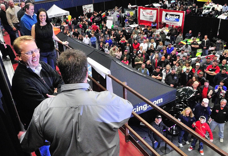 Ricky Craven, left, talks with show promoter Steve Perry at the Northeast Motorsports Show at the Augusta Civic Center on Friday.