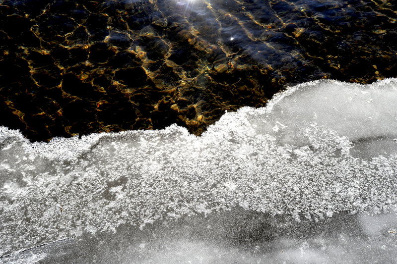 Deeply textured ice had formed along the banks of the Presumpscot River in Windham on Thursday.