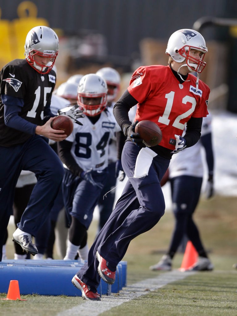 Tom Brady runs through drills at a practice in Foxborough last week. The veteran quarterback is 16-6 in the postseason – a mark that will change for better or for worse against Houston.