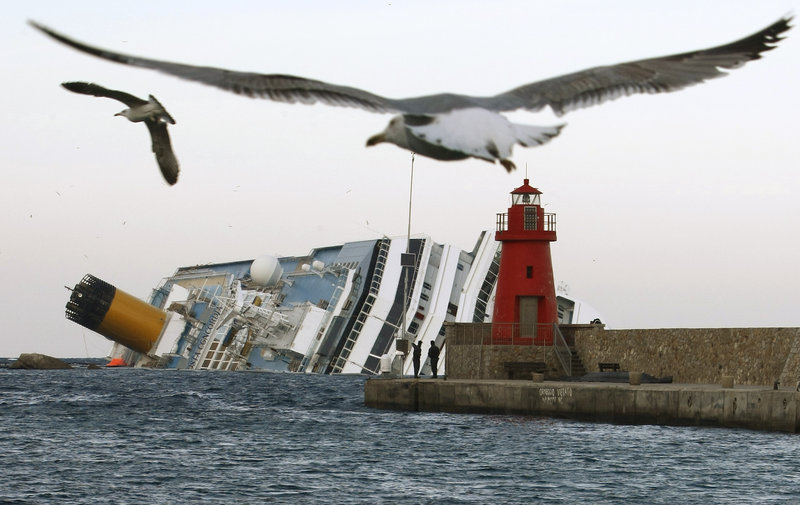 The Costa Concordia remains high and dry off the Tuscan island of Giglio, Italy. The ship went aground on Jan. 13, 2012.