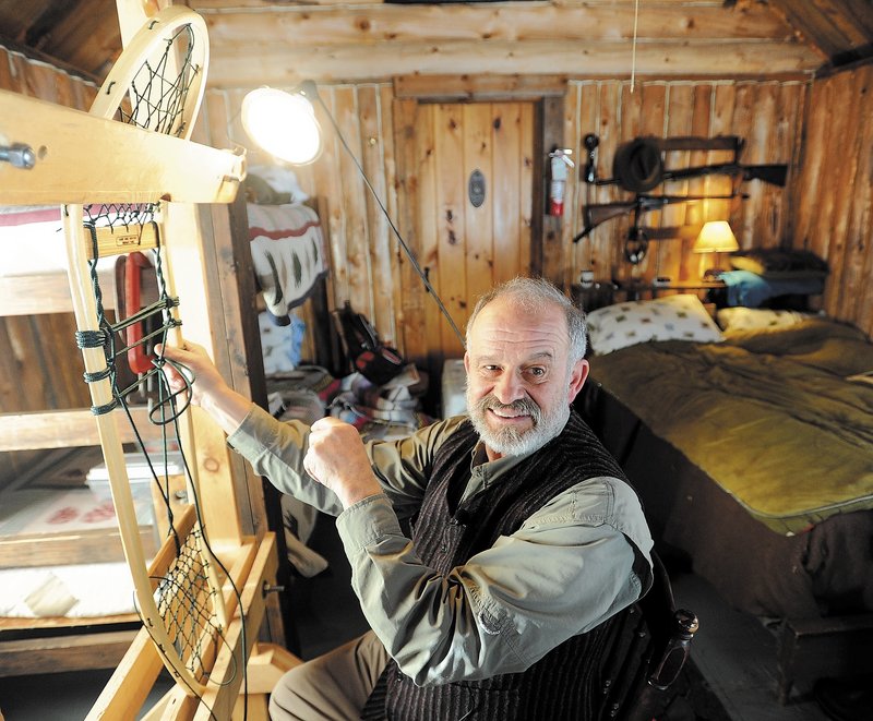 Dave Giampetruzzi, 63, of China, a 43-year Army veteran, fabricates a snowshoe in his cabin at Pine Grove Lodge, a 50-room hunting and fishing lodge in Pleasant Ridge Plantation. Giampetruzzi teaches snowshoe making for the Pine Grove Program, which hosts veterans and service members on select weekends for therapeutic wilderness adventures.