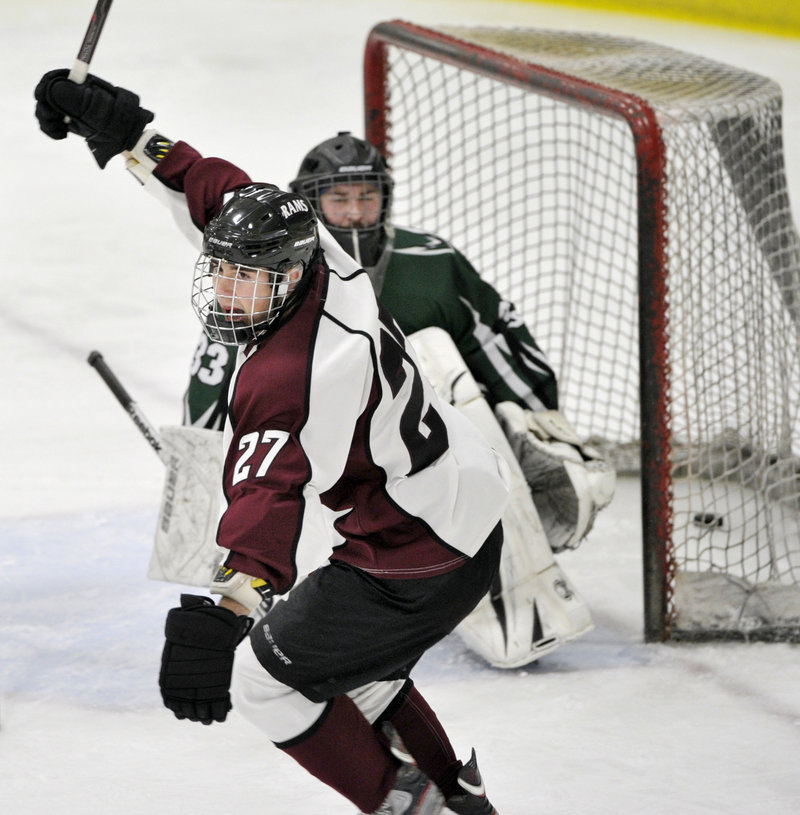 Jared Wood celebrates his second-period goal Monday night that gave Gorham a 3-2 lead. The Rams tacked on two third-period goals to post a 5-2 win over previously unbeaten Bonny Eagle.