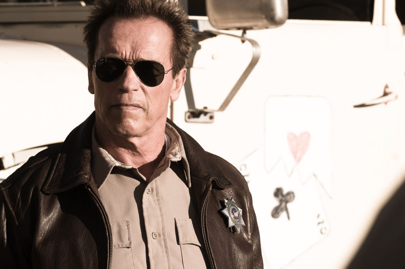Arnold Schwarzenegger is back in action-hero mode in “The Last Stand.” Forest Whitaker, below, also stars.