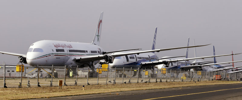 Boeing 787 Dreamliners sit parked Thursday at Paine Field in Everett, Wash. The Federal Aviation Administration has grounded the technologically advanced aircraft until the risk of battery fires and corrosion is resolved.