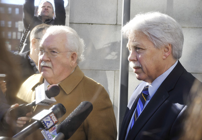 Defense attorney Dan Lilley (left) and his client, Mark Strong Sr., speak to the media outside of Cumberland County Court following a hearing Friday, Jan. 18, 2013.