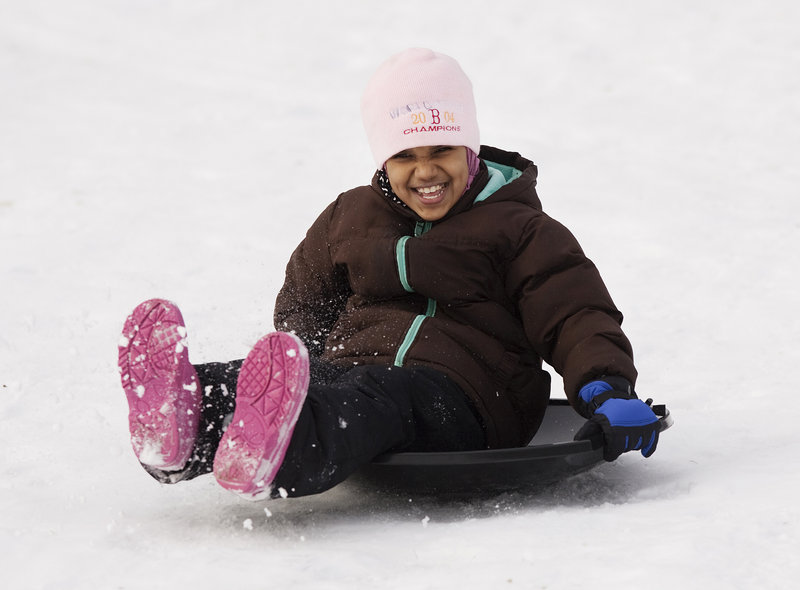Sara Dhalai, 8, of Portland finds out sliding downhill isn’t so scary