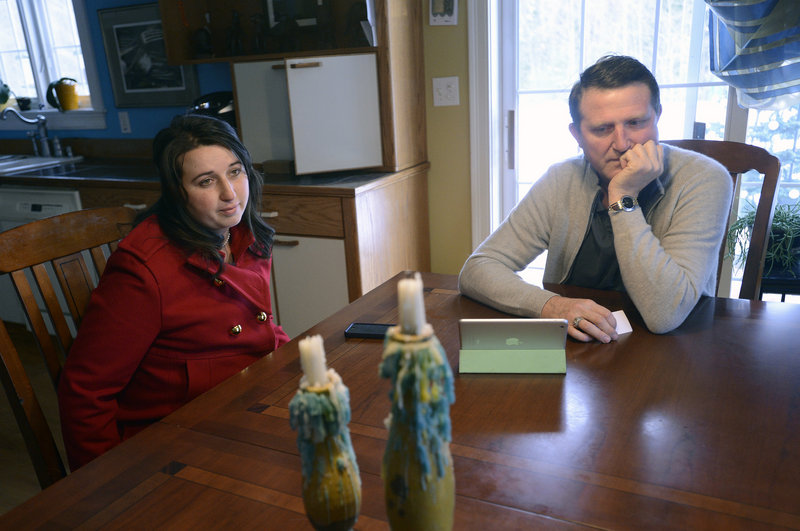 Alla Sherstyukov of Westbrook and her father, Sergey Fisenko, reflect on the life of Margarita Fisenko Scott, 29, Sunday at Sergey’s home in Scarborough. Scott, whose body was found Thursday outside a Motel 6, was Sherstyukov’s cousin and Fisenko’s niece.