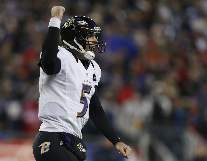 Ravens quarterback Joe Flacco celebrates after his third touchdown pass of the game – an 11-yarder to Anquan Boldin that clinched Baltimore’s 28-13 win Sunday over the New England Patriots in the AFC championship game.