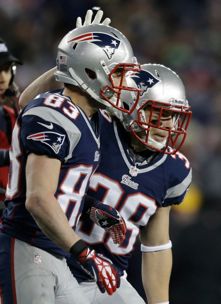 Wes Welker, left, is a free agent, and the Patriots have a huge decision to make - pay him a lot of money to stay, or lose him.