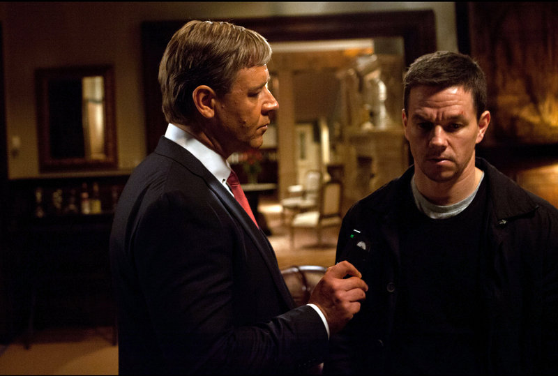 Russell Crowe, left, and Mark Wahlberg co-star in the crime thriller “Broken City.”