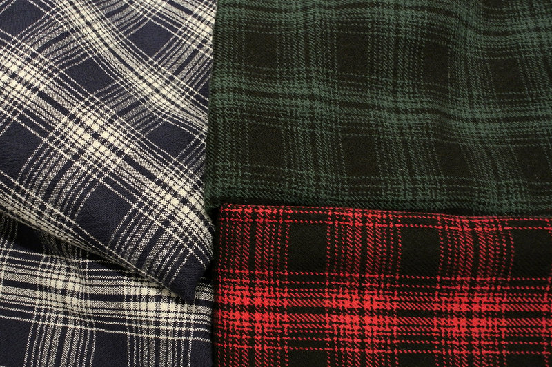 Maine Woolens of Brunswick makes these Oakley plaid blankets. Maine Woolens’ products are cotton or wool, and are piece-dyed in Brunswick.