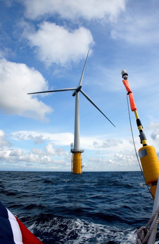 Plans by the Norwegian energy giant Statoil to develop a $120 million wind turbine demonstration project off Maine's coast depend on whether state regulators approve the company's proposed electricity rate and contract terms at a meeting Thursday. The Maine turbines would look similar to the Hywind test turbine (seen here), now producing power off the coast of Norway.