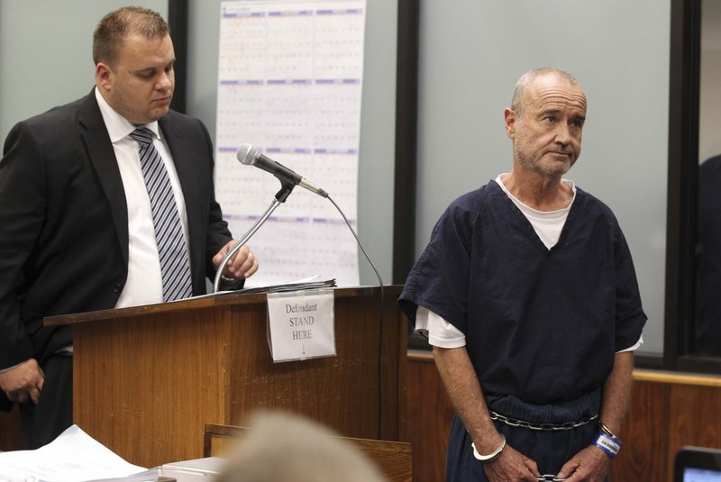 Peter Robbins, right, the voice of Charlie Brown in “Peanuts,” appears in court on charges of stalking and threatening.