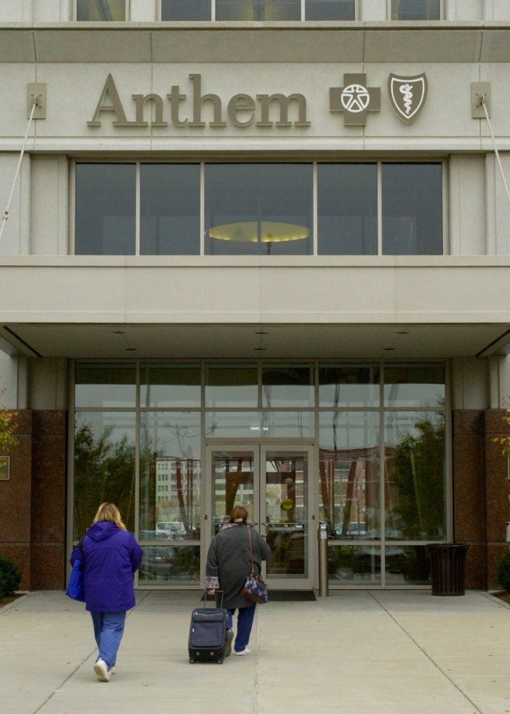 Employees enter Anthem Inc. headquarters in Indianapolis. PL 90 lets Anthem Health Plans of Maine and other insurers implement individual policy rate hikes without forcing them “to lose money in other markets,” a reader says.